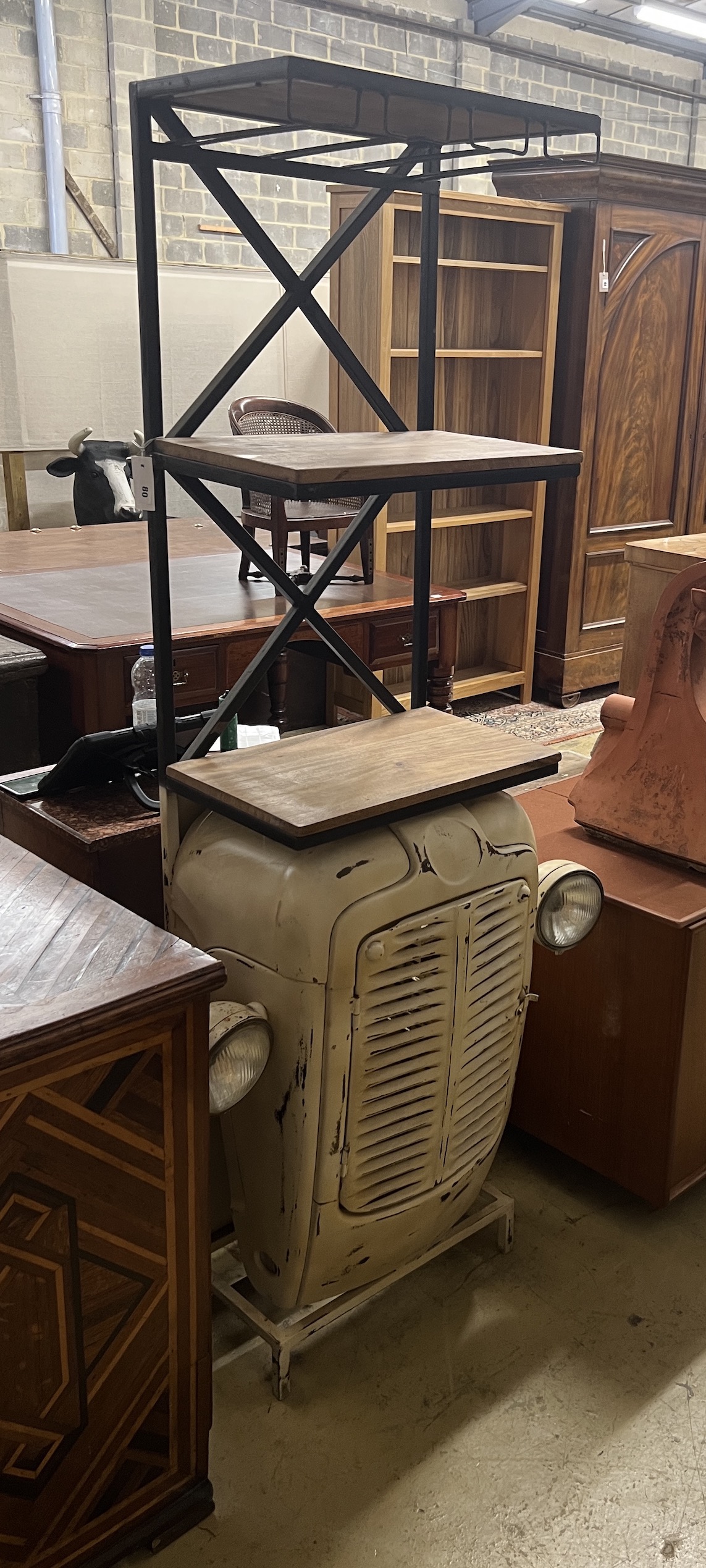 A vintage 'tractor' front bar, length 81cm, depth 34cm, height 182cm